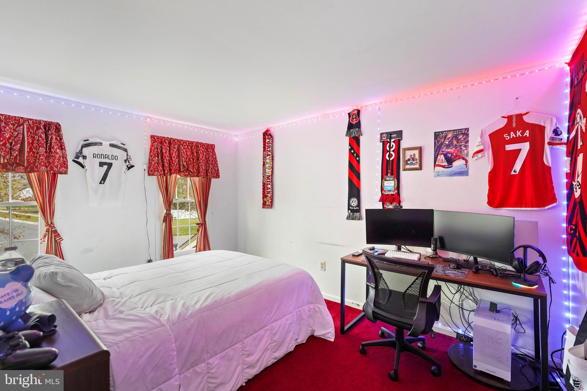 13940 Alderton Road Silver Spring, MD 20906 - Photo 23 of 41 a bedroom with a bed and a desk