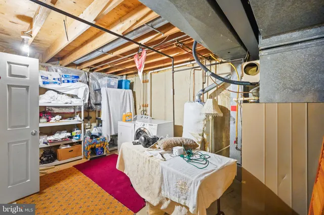 a view of roof deck with wooden floor and fence