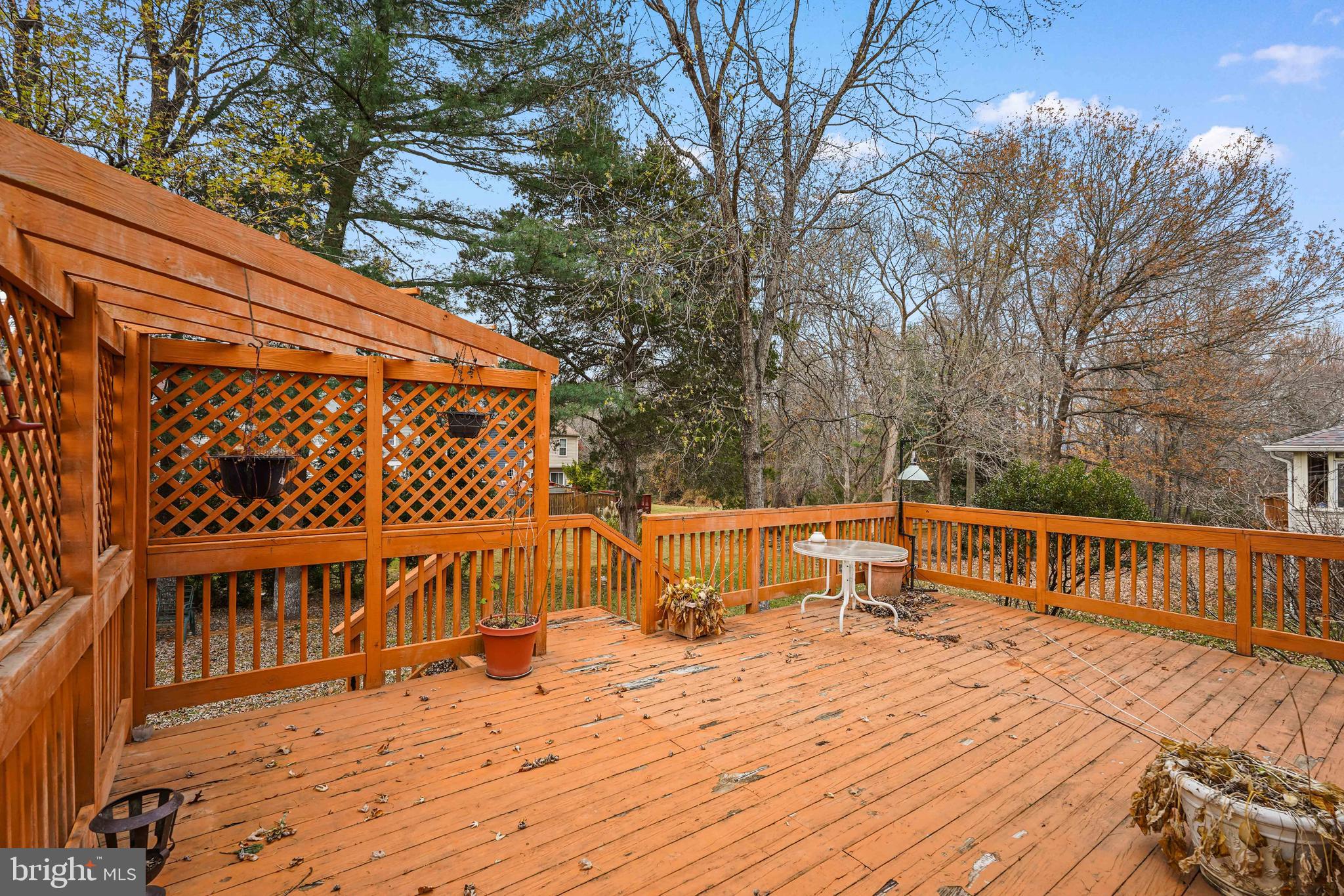 13940 Alderton Road Silver Spring, MD 20906 - Photo 33 of 41 a view of roof deck with wooden floor and fence