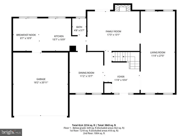 a black and white photo of a living room