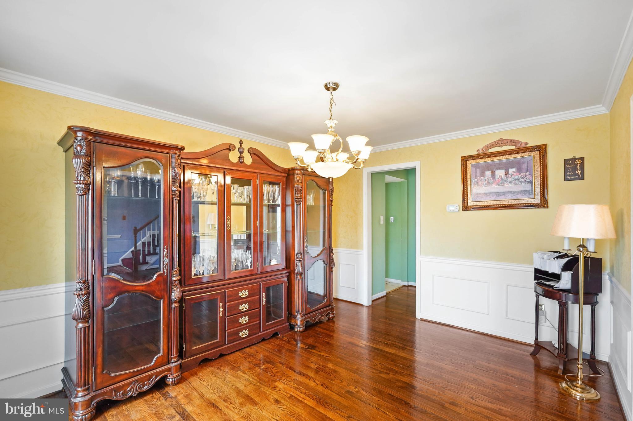 13940 Alderton Road Silver Spring, MD 20906 - Photo 9 of 41 a view of a bedroom with furniture window and wooden floor