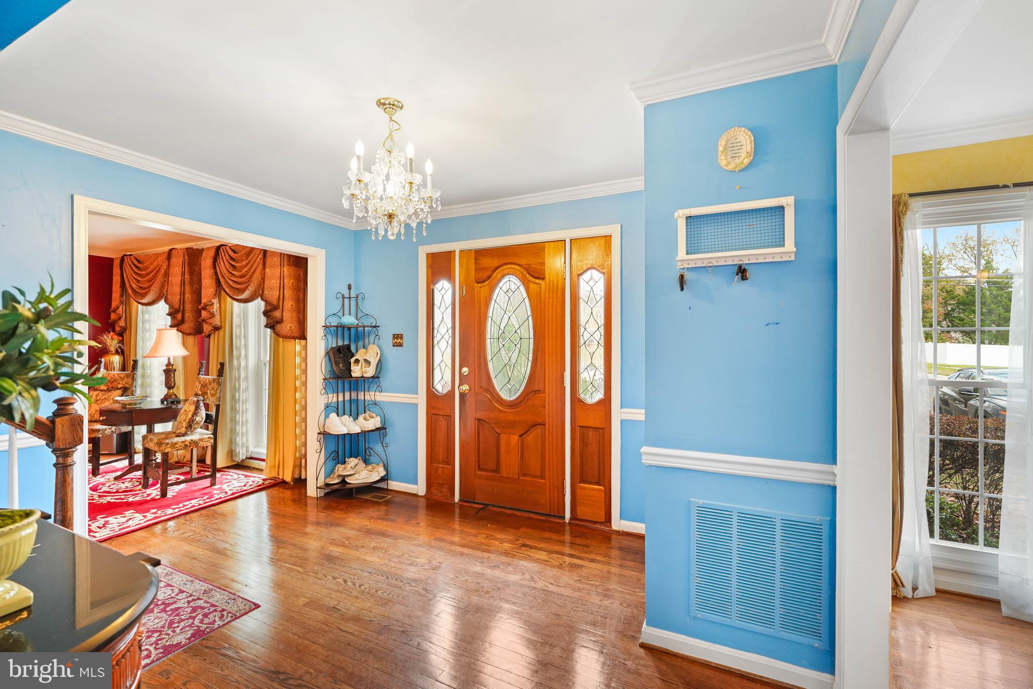 13940 Alderton Road Silver Spring, MD 20906 - Photo 10 of 41 a view of an entryway with wooden floor and door