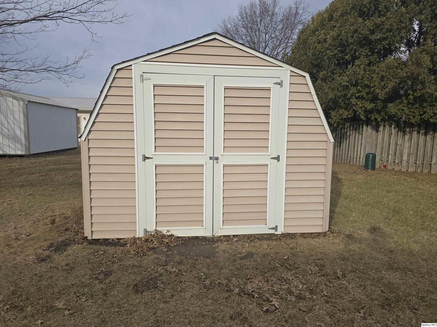 239 Rogers Road Carthage, IL 62321 - Photo 22 of 23 a view of a house with a outdoor space