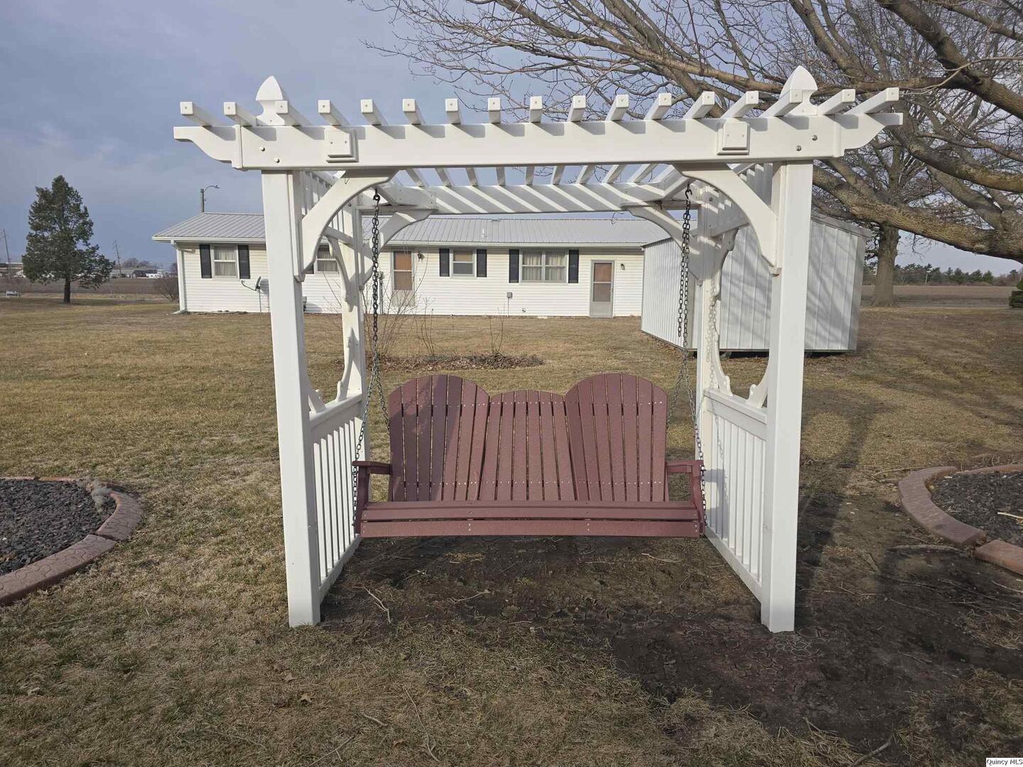 239 Rogers Road Carthage, IL 62321 - Photo 23 of 23 a view of a house with a porch
