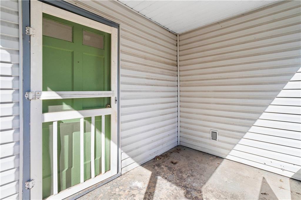 3589 Orchard Circle Decatur, GA 30032 - Photo 17 of 27 a view of a house with a door and a window
