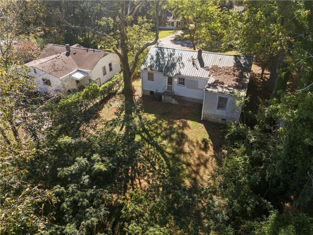3589 Orchard Circle Decatur, GA 30032 - Photo 21 of 27 an aerial view of residential house with outdoor space and trees all around
