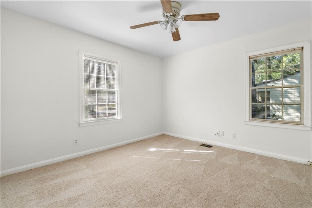 3589 Orchard Circle Decatur, GA 30032 - Photo 10 of 27 an empty room with windows