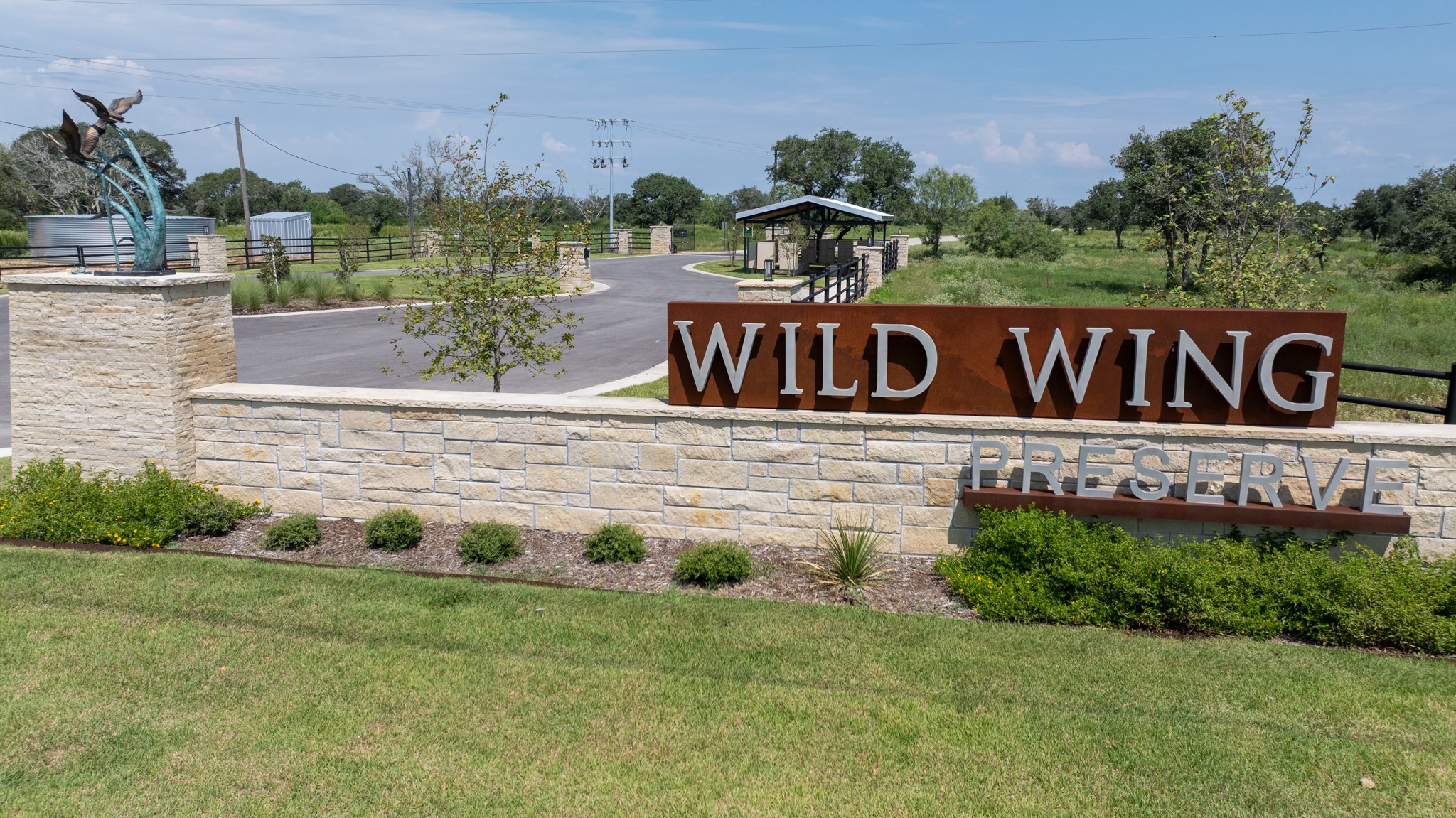 Tbd Shorebird Lane Columbus, TX 78934 - Photo 1 of 21 a view of sign board with tall buildings