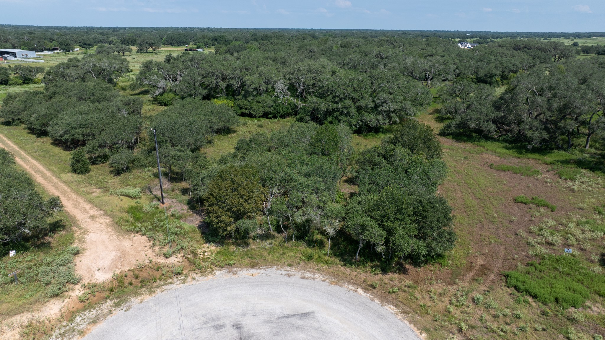 Tbd Shorebird Lane Columbus, TX 78934 - Photo 10 of 21 an aerial view of a yard with a tree