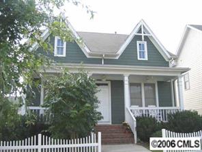 416 Third Baxter Street Fort Mill, SC 29708 - Photo 1 of 8 front view of a house with a bench