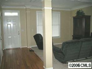 416 Third Baxter Street Fort Mill, SC 29708 - Photo 5 of 8 a living room with furniture and a gate