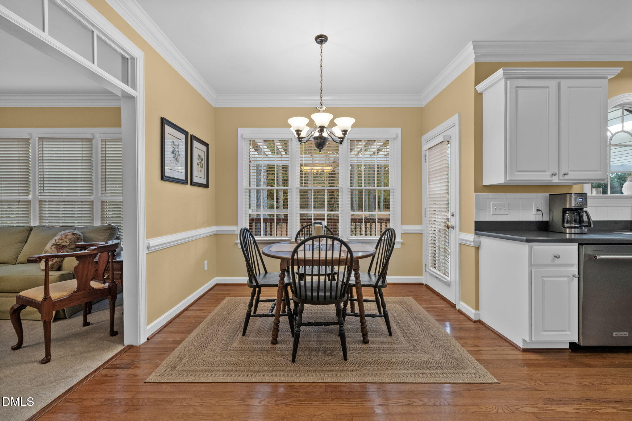 2605 Lizei Street Raleigh, NC 27616 - Photo 17 of 46 a view of a dining room with furniture window and outside view