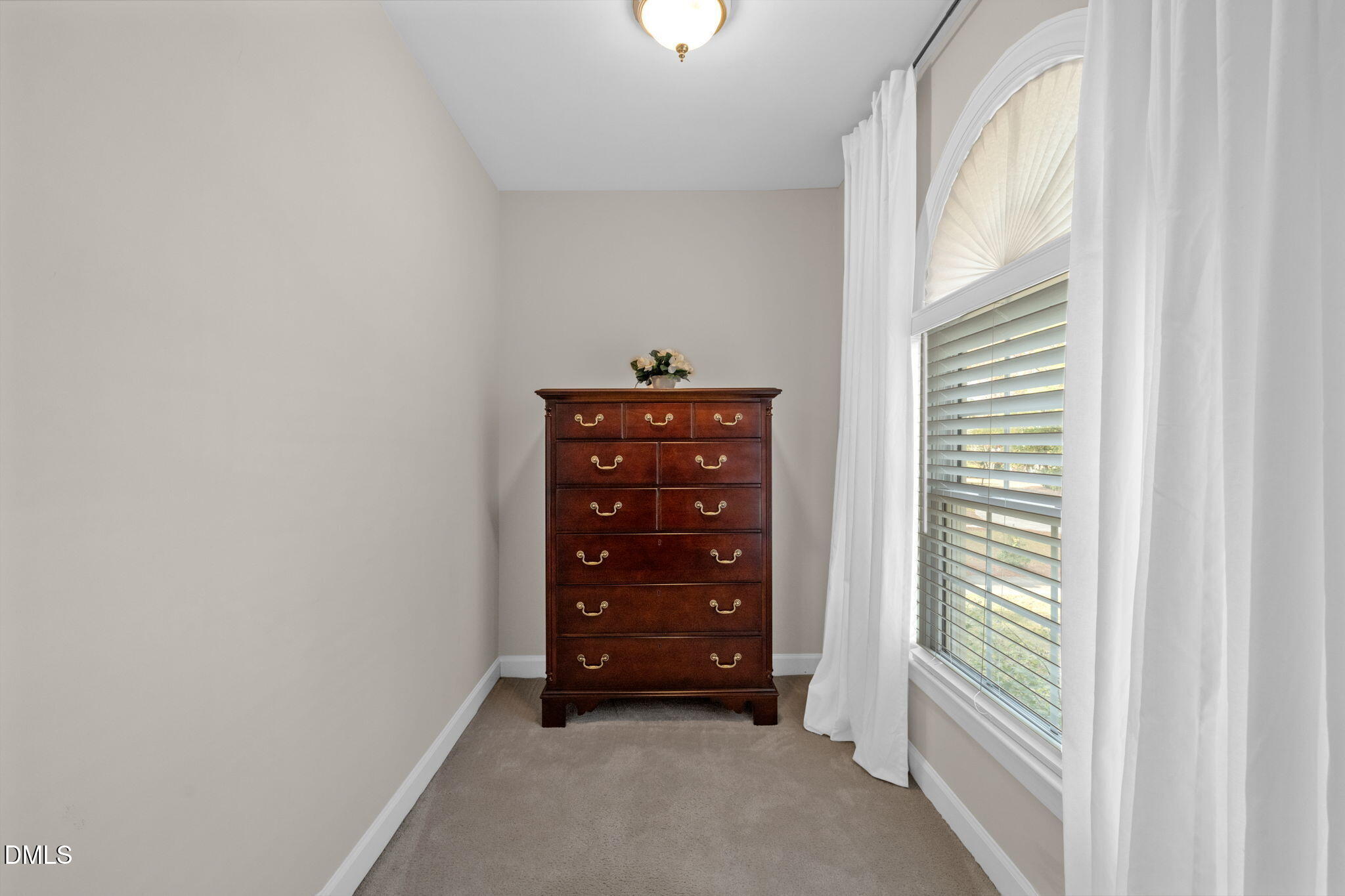 2605 Lizei Street Raleigh, NC 27616 - Photo 22 of 46 a view of room with windows and closet