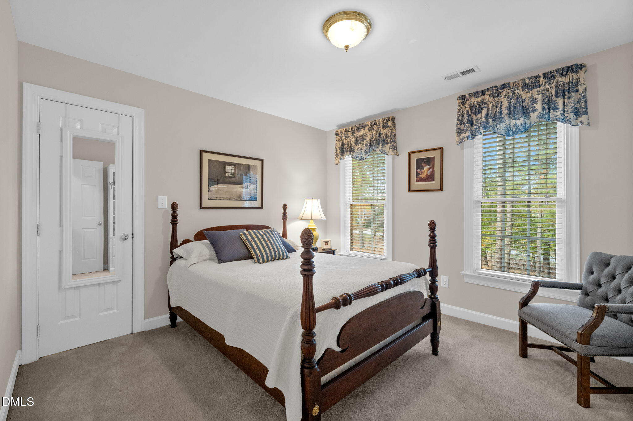 2605 Lizei Street Raleigh, NC 27616 - Photo 28 of 46 a bedroom with a bed and a couch
