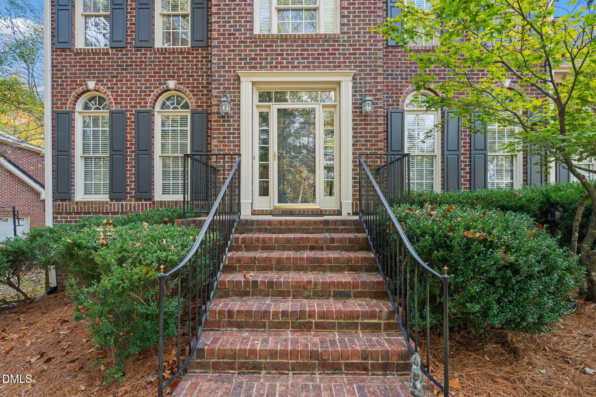 2605 Lizei Street Raleigh, NC 27616 - Photo 44 of 46 a front view of a house with a garden