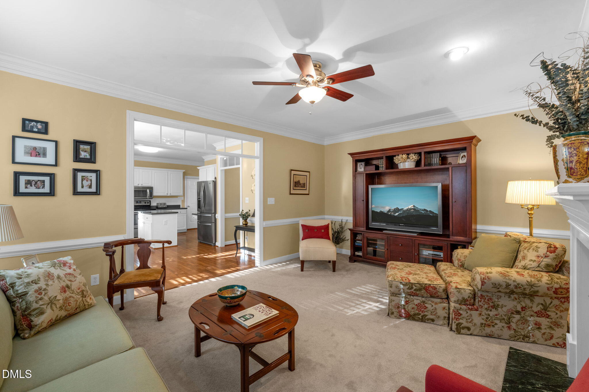 2605 Lizei Street Raleigh, NC 27616 - Photo 10 of 46 a living room with furniture and a flat screen tv