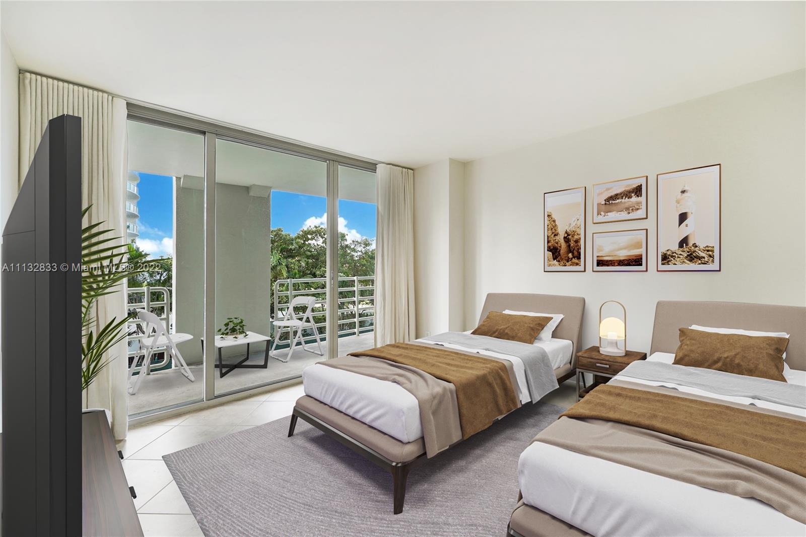 2025 Brickell Avenue, Unit 605 Miami, FL 33129 - Photo 11 of 21 Sun-filled Guest Bedroom (virtually staged)