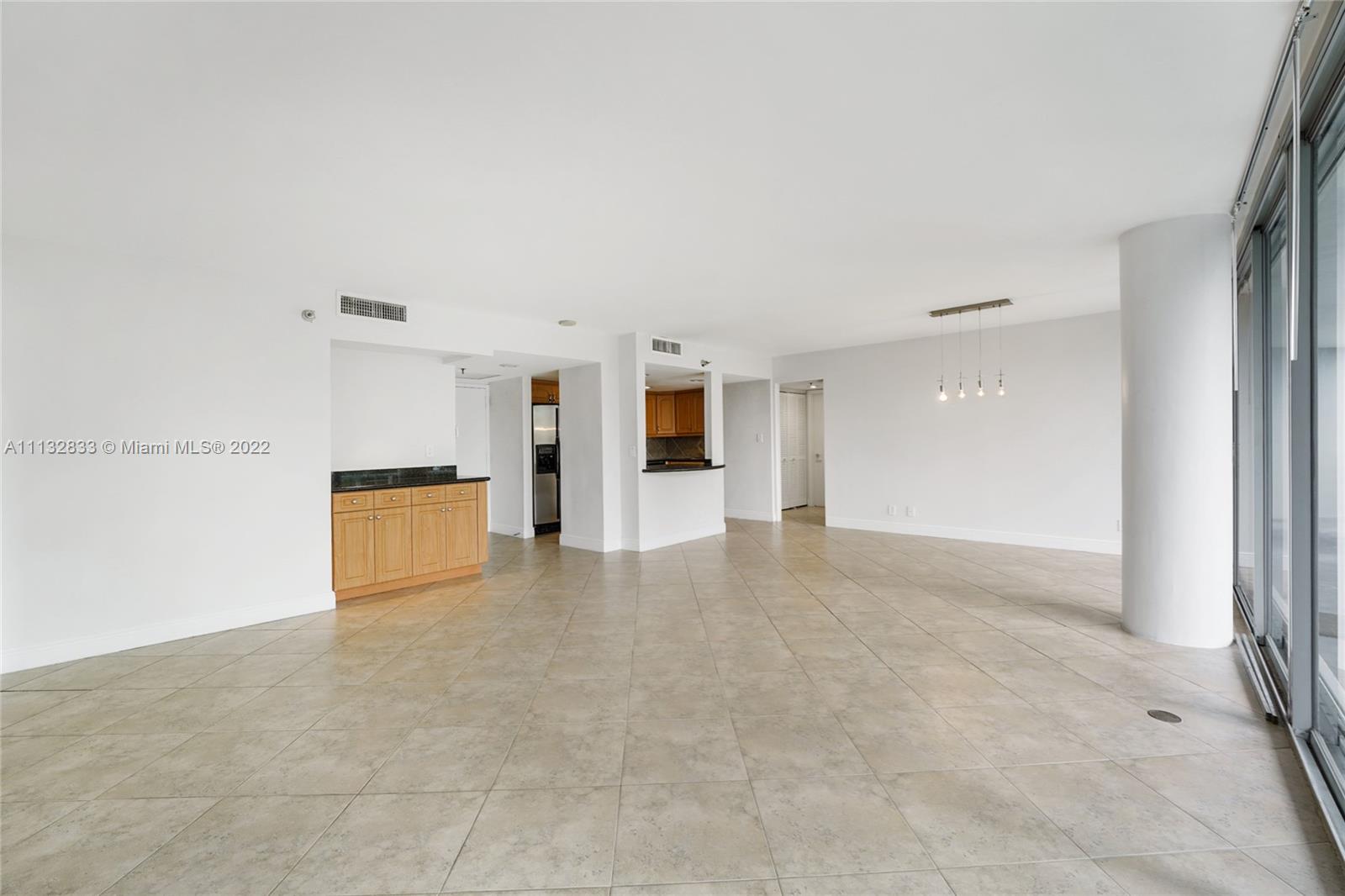 2025 Brickell Avenue, Unit 605 Miami, FL 33129 - Photo 4 of 21 Neutral Ceramic Floors and Fresh Paint Await the Next Lucky Buyer