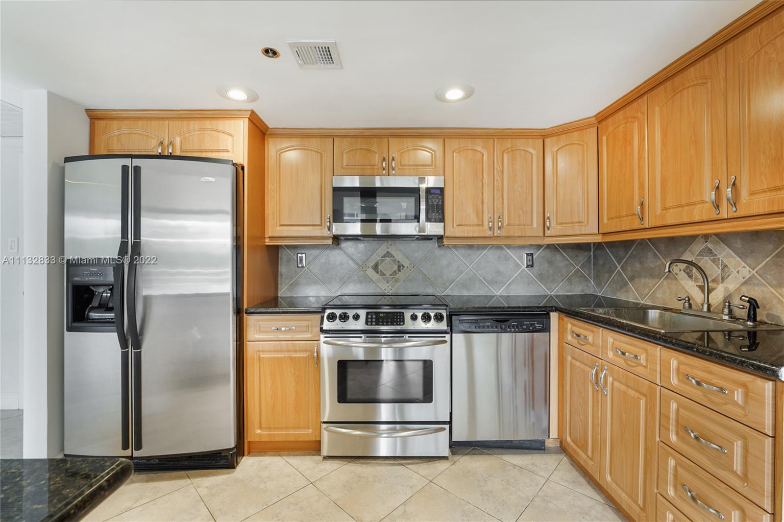 2025 Brickell Avenue, Unit 605 Miami, FL 33129 - Photo 5 of 21 Superb Kitchen With Stainless Steel Appliances