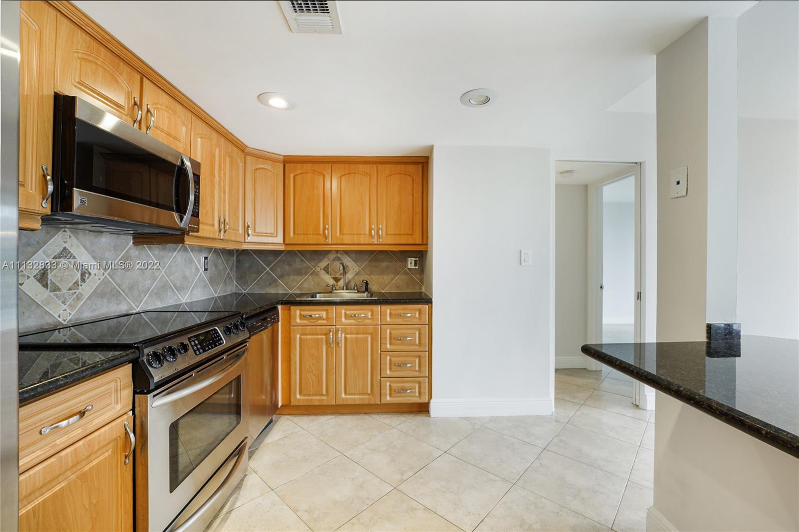 2025 Brickell Avenue, Unit 605 Miami, FL 33129 - Photo 6 of 21 Superb Kitchen With Stainless Steel Appliances