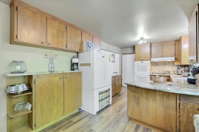 a view of a back yard from a balcony