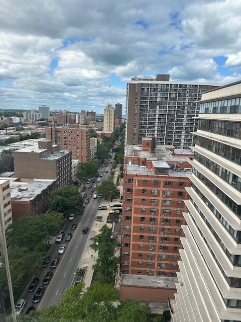 5757 North Sheridan Road, Unit 18J Chicago, IL 60660 - Photo 11 of 19 a view of a city with tall buildings