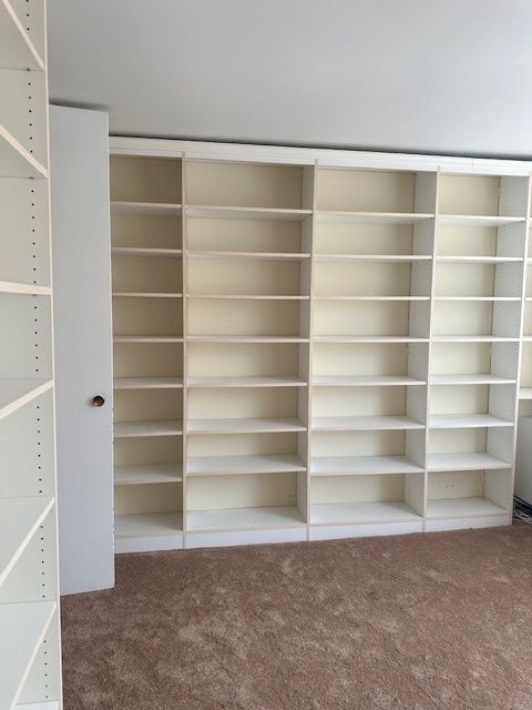 5757 North Sheridan Road, Unit 18J Chicago, IL 60660 - Photo 14 of 19 a view of room with empty empty shelves