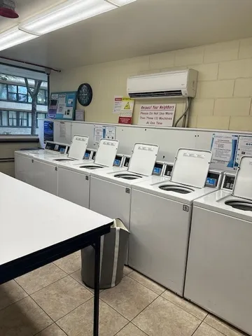 a view of gallery with wooden floor