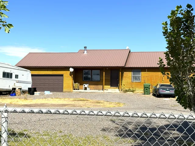 a view of a house with a swimming pool