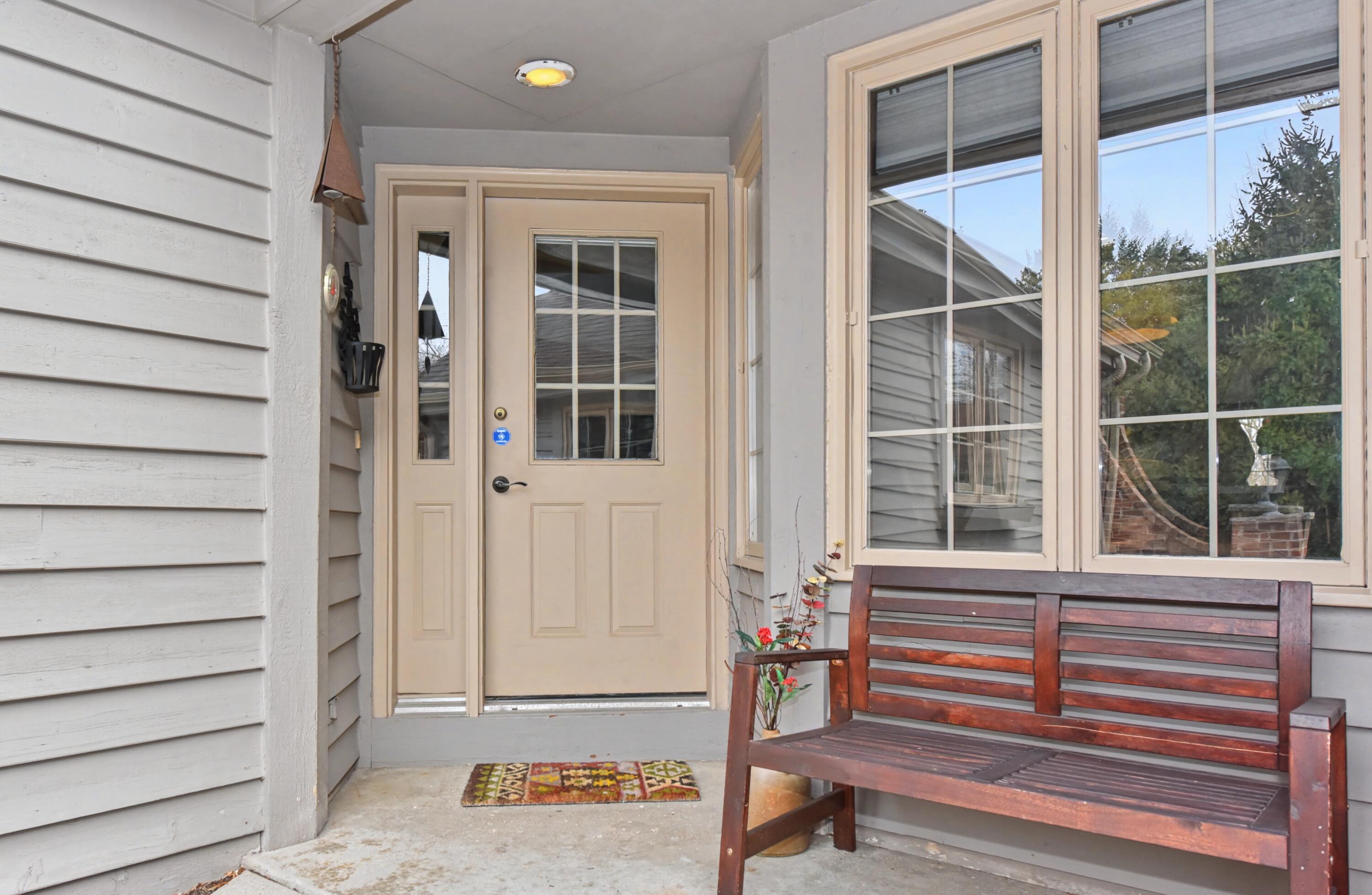 2870 Teal Ridge Court, Unit B Brookfield, WI 53045 - Photo 2 of 42 Private front entrance with welcoming porch, offering a quiet and comfortable entry to the home.