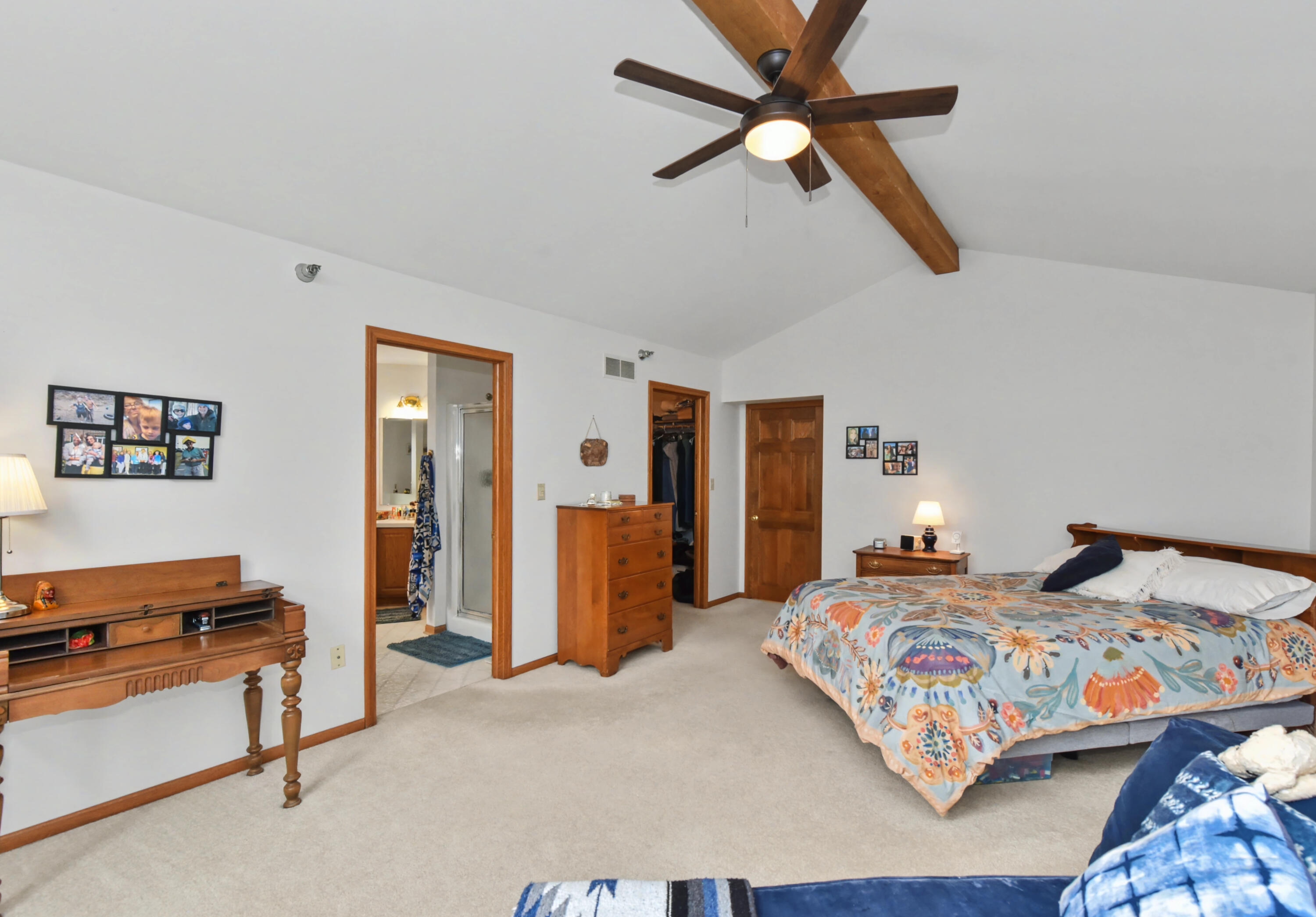 2870 Teal Ridge Court, Unit B Brookfield, WI 53045 - Photo 22 of 42 Primary suite with direct access to the walk-in closet and private bathroom.