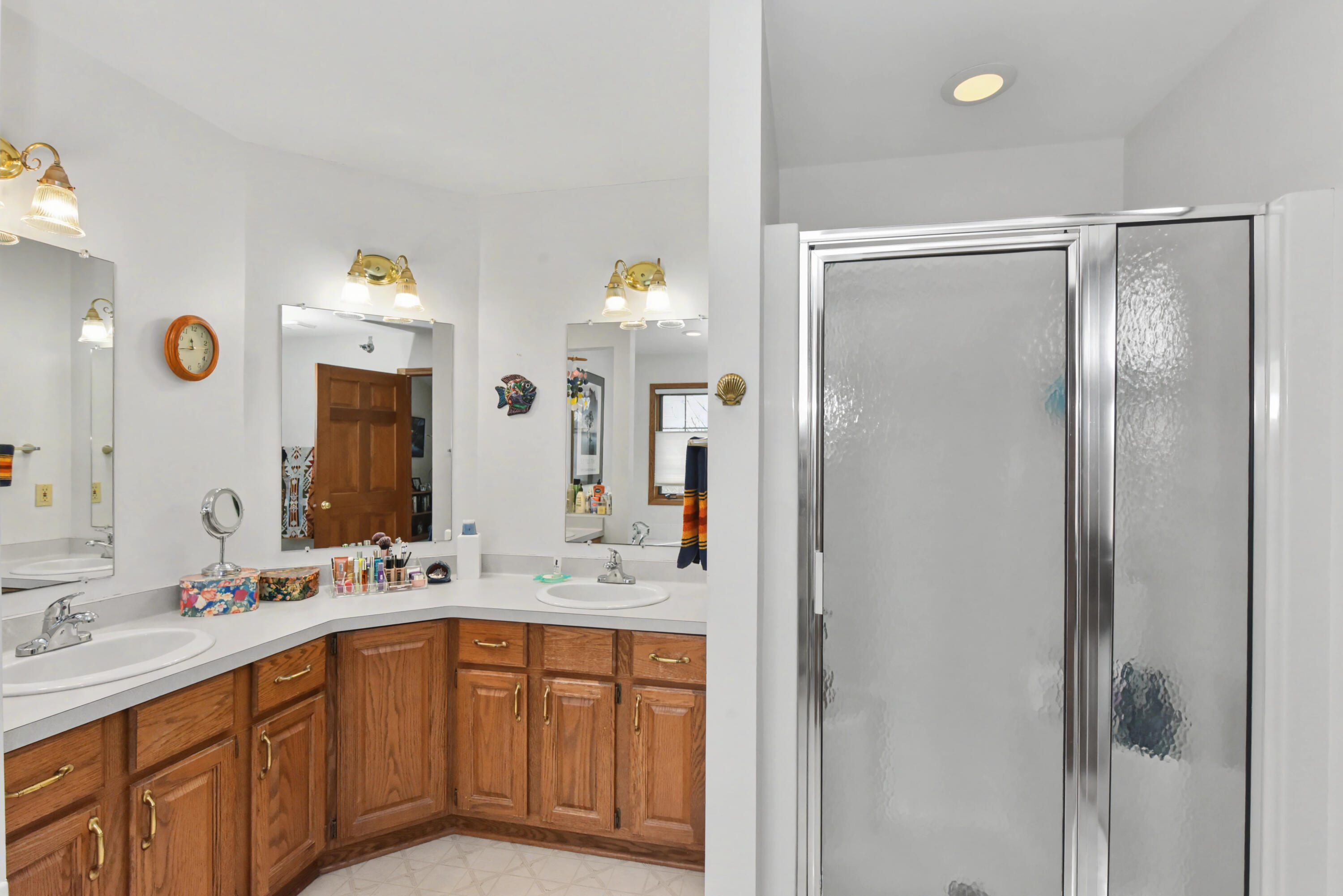 2870 Teal Ridge Court, Unit B Brookfield, WI 53045 - Photo 23 of 42 Primary bathroom with double vanity and walk-in shower.