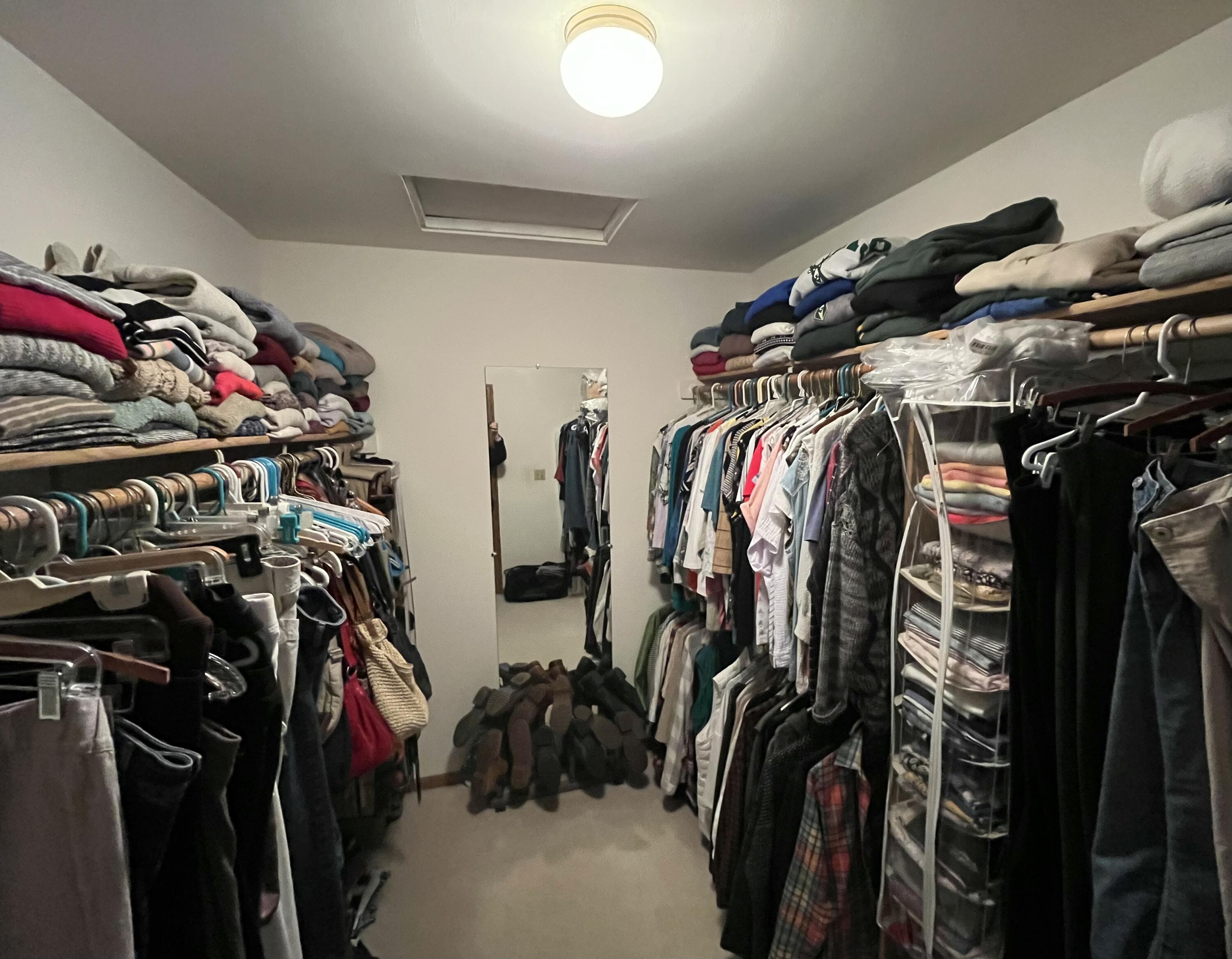 2870 Teal Ridge Court, Unit B Brookfield, WI 53045 - Photo 25 of 42 Spacious walk-in closet in the primary suite with plenty of room for organized storage.