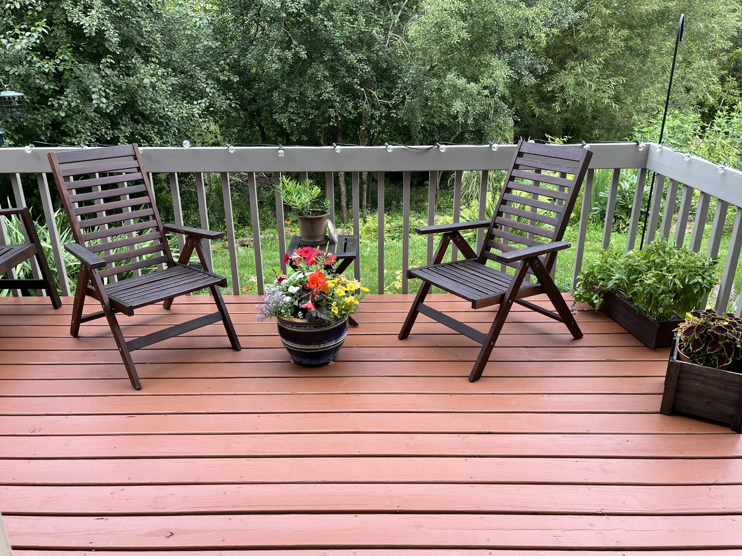 2870 Teal Ridge Court, Unit B Brookfield, WI 53045 - Photo 33 of 42 Private deck surrounded by lush greenery, offering a peaceful outdoor space with conservancy views.