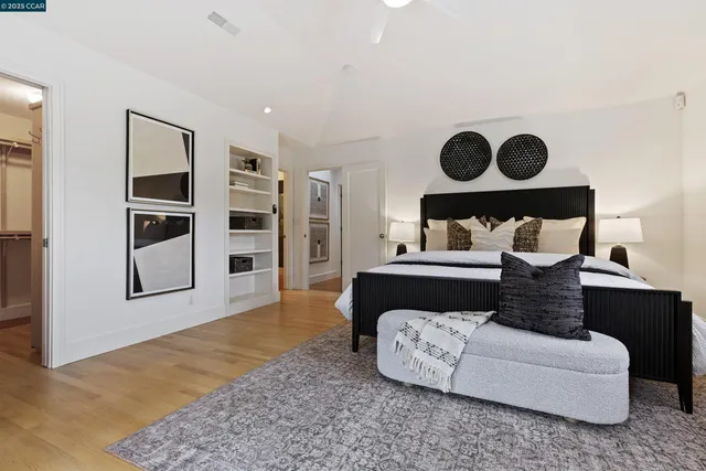 a view of patio with couches and a fire pit