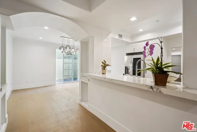 a view of kitchen with furniture and potted plant