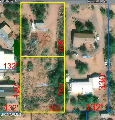 a view of a lot of trees in a field