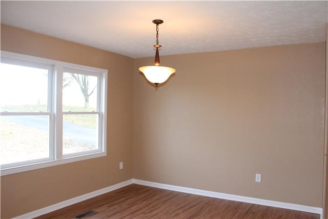 3024 New Hall Road Greenbrier, TN 37073 - Photo 7 of 18 The Formal Dining Room is just off the Kitchen and open to the Living Room
