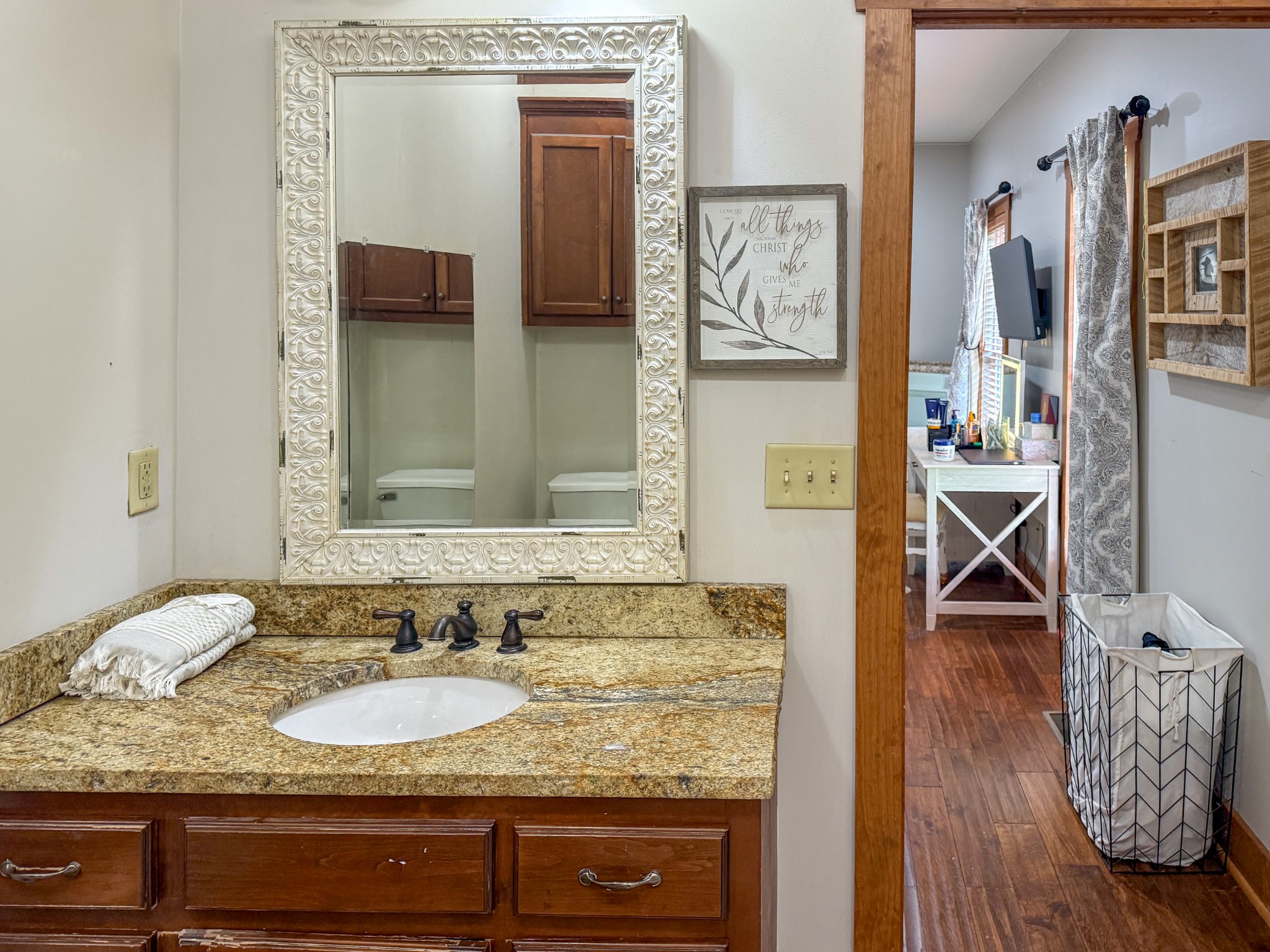 4383 North Chapel Road Franklin, TN 37067 - Photo 14 of 43 a bathroom with a granite countertop sink and a mirror