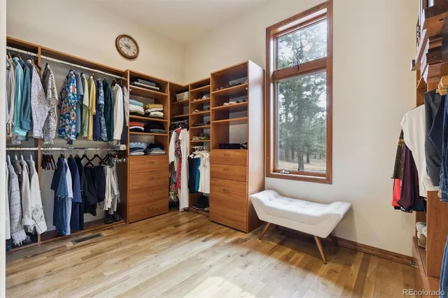 a livingroom with furniture entryway and a window