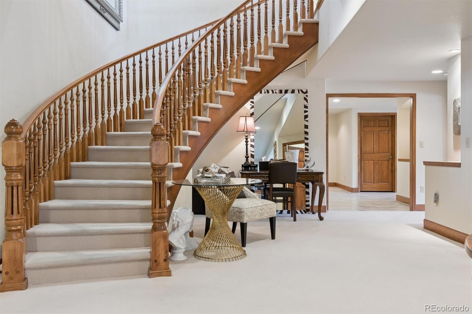 8061 Sugar Loaf Road Larkspur, CO 80118 - Photo 31 of 48 a view of entryway and hall