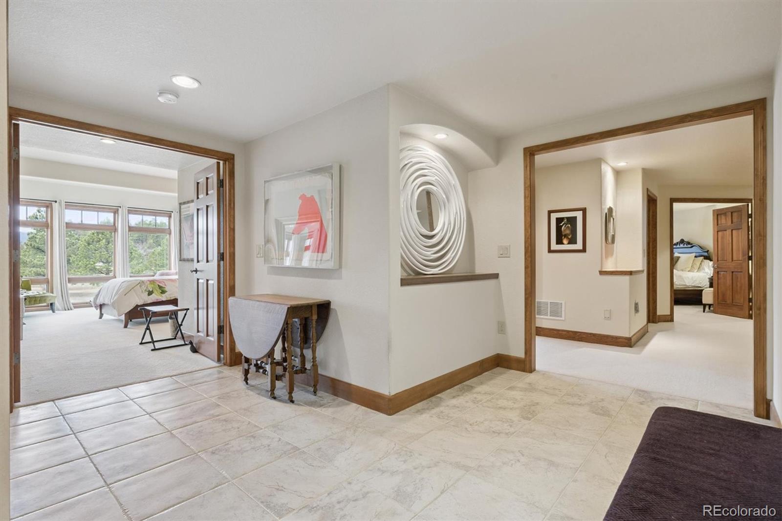 8061 Sugar Loaf Road Larkspur, CO 80118 - Photo 41 of 48 a view of a livingroom with furniture and a window
