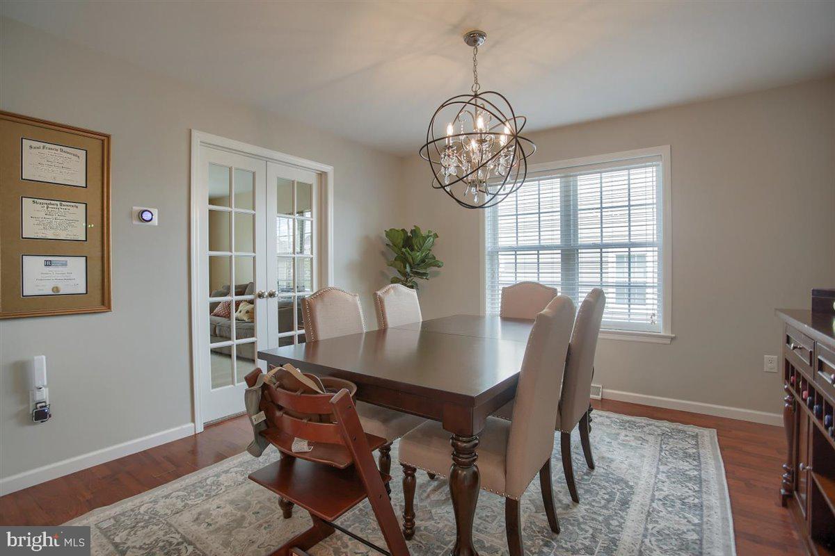716 Wallingford Road Lititz, PA 17543 - Photo 11 of 38 Formal Dining Room with Laminate Wood Floors