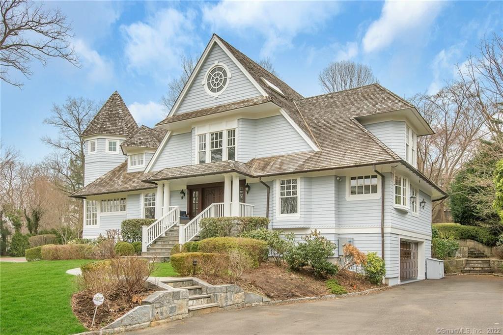 26 Glen Avon Drive Greenwich, CT 06878 - Photo 1 of 1 a front view of a house with garden