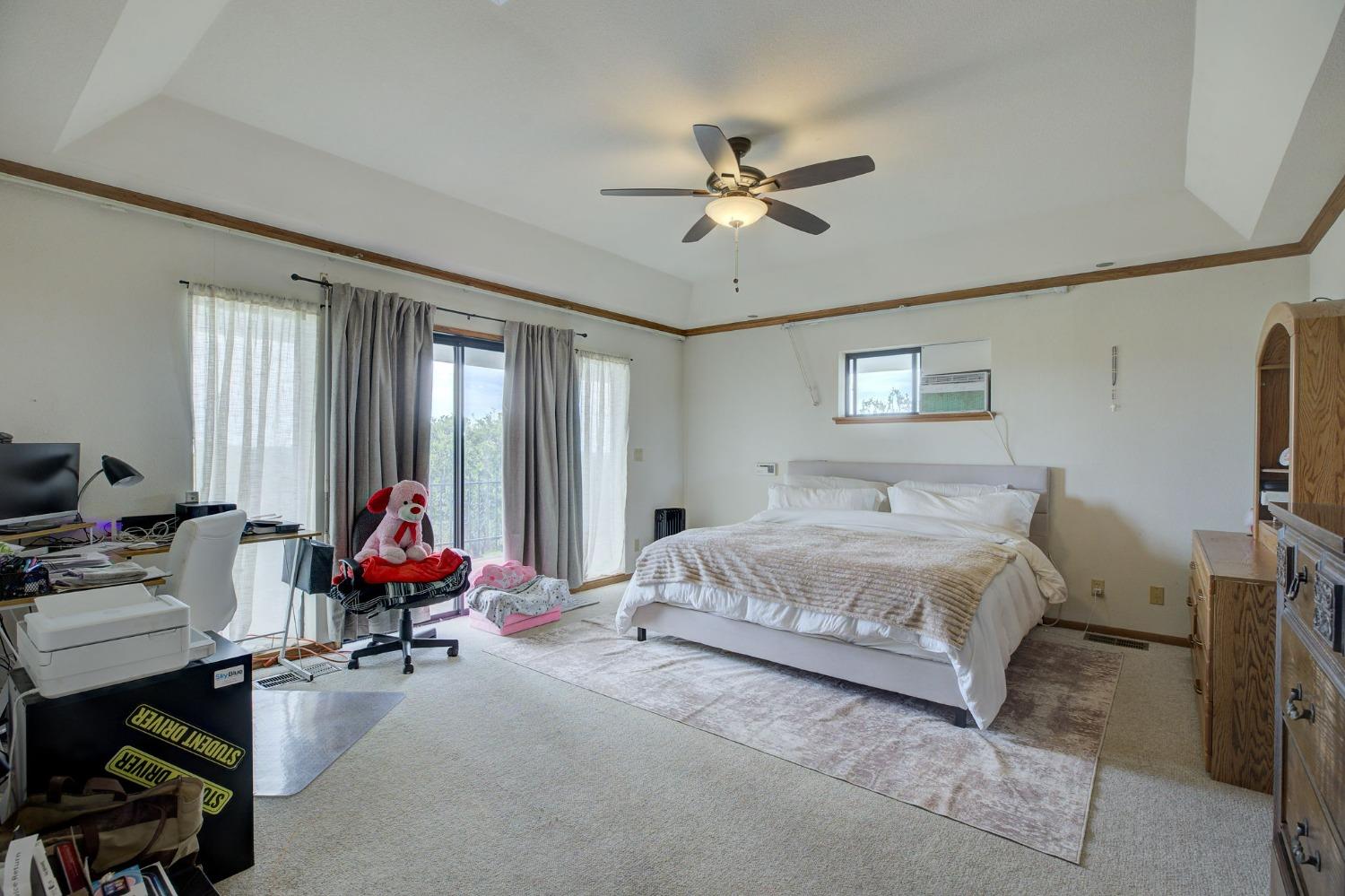 1095 Cold Springs Road Placerville, CA 95667 - Photo 25 of 55 a bedroom with a bed gym equipment and view of living room