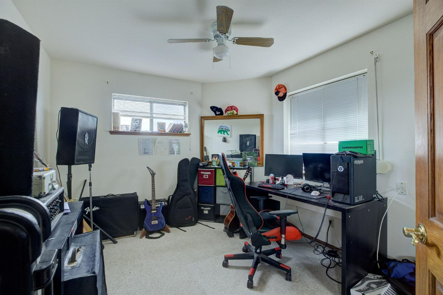 1095 Cold Springs Road Placerville, CA 95667 - Photo 32 of 55 a view of a workspace with furniture and a window