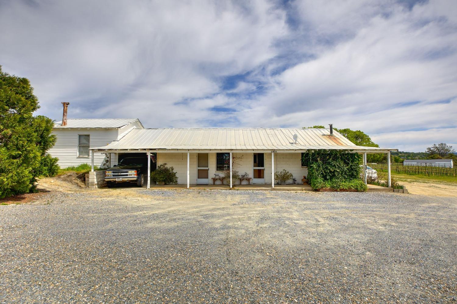 1095 Cold Springs Road Placerville, CA 95667 - Photo 36 of 55 a view of a house next to a big yard