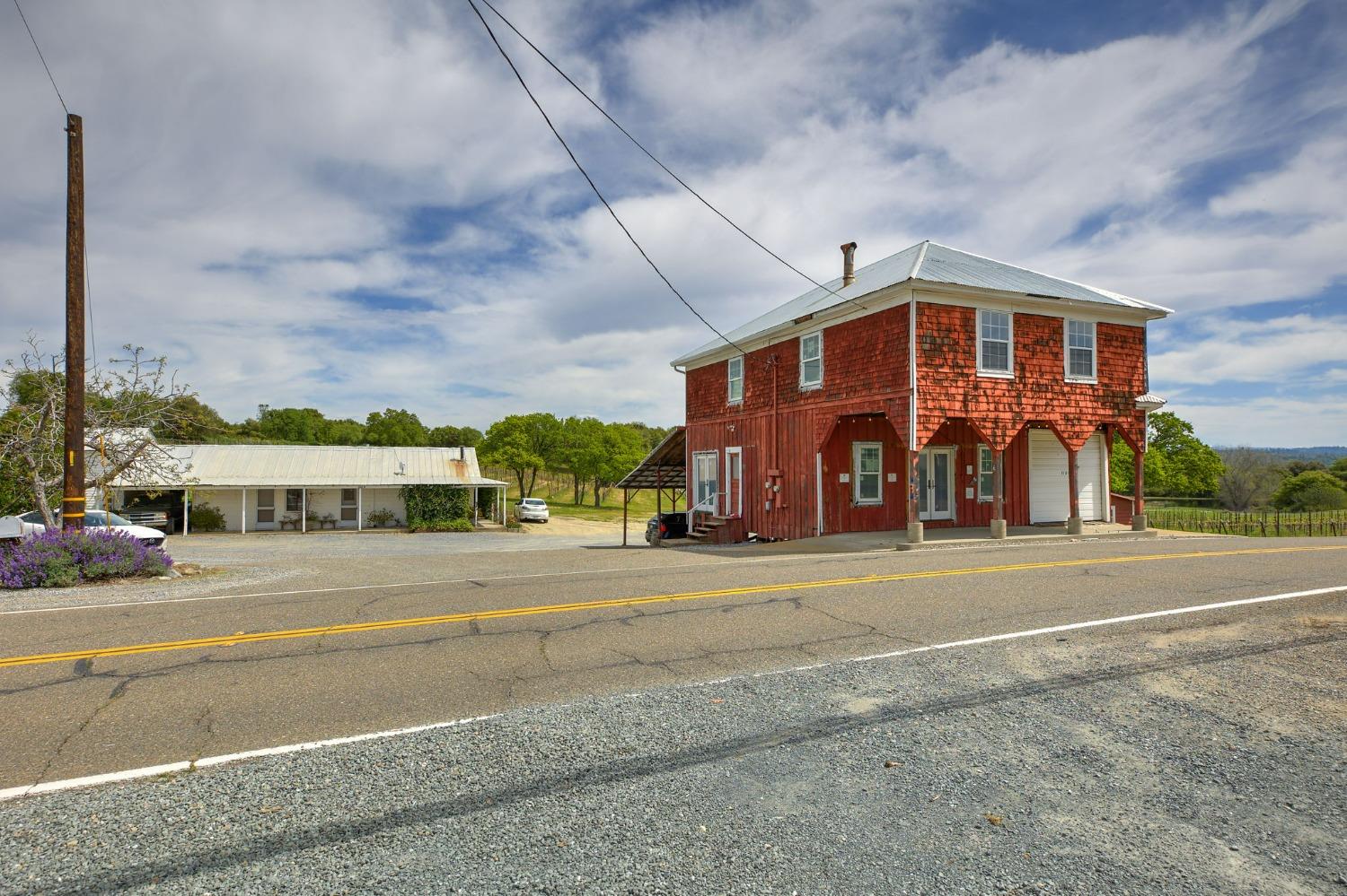 1095 Cold Springs Road Placerville, CA 95667 - Photo 41 of 55 a front view of a building with a yard
