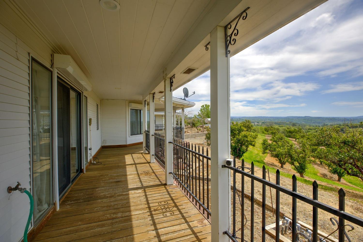 1095 Cold Springs Road Placerville, CA 95667 - Photo 6 of 55 a view of a balcony with wooden floor