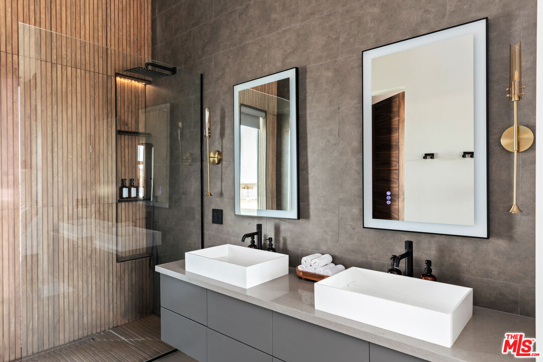 3000 Rockwood Road Joshua Tree, CA 92252 - Photo 45 of 71 a bathroom with a sink and a mirror